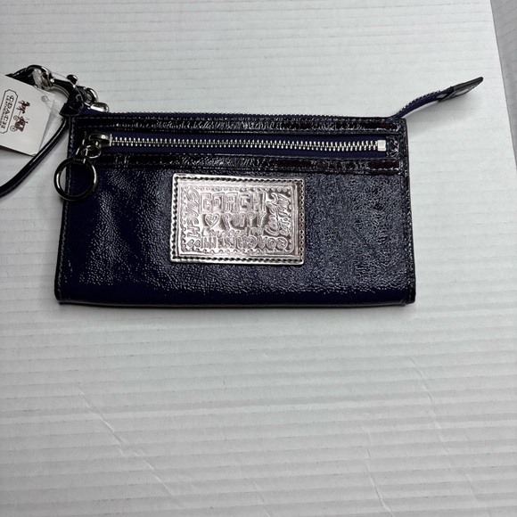 Coach Handbags - New COACH Poppy Purple Patent Leather Wristlet Wallet